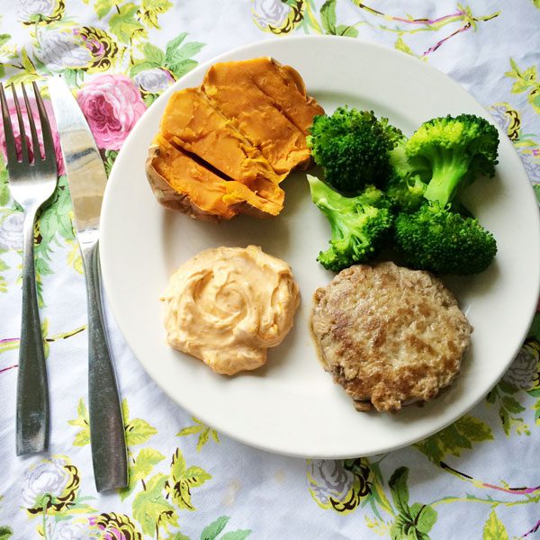 Lamb burger sweet potato broccoli and harissa yoghurt