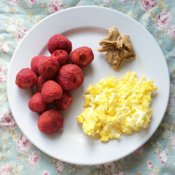 Strawberries scrambled eggs and peanut butter