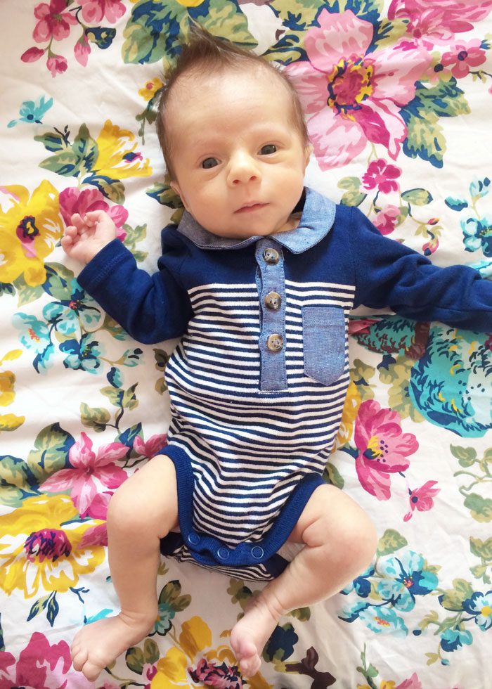 Finley in cute baby vest