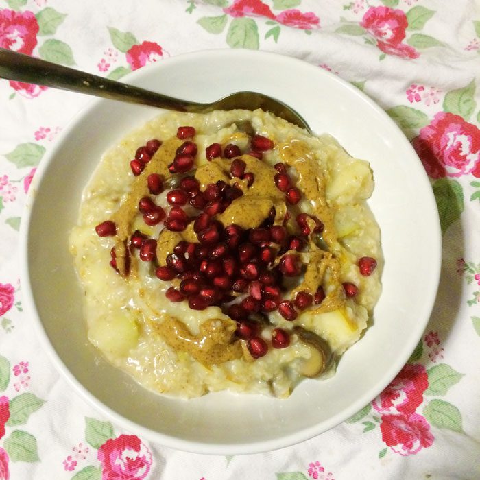 Porridge with pear pomegranate and almond butter
