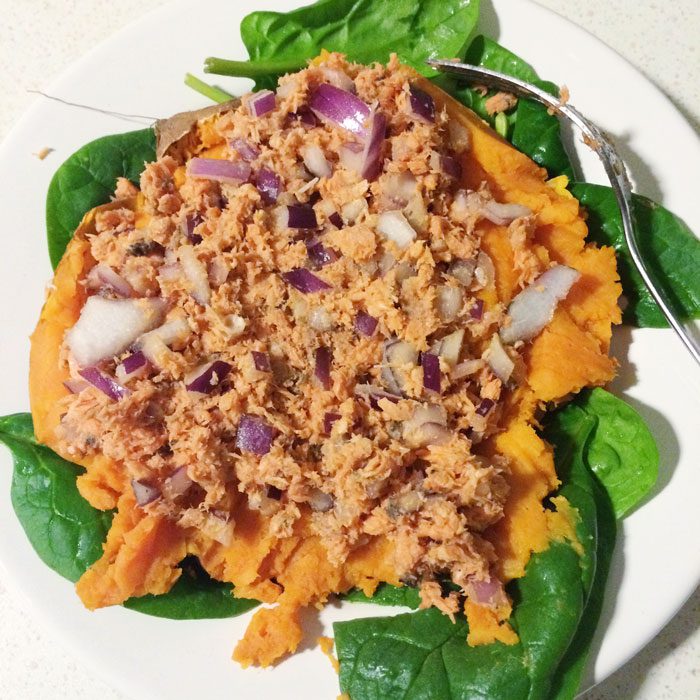 Sweet potato with salmon and red onion