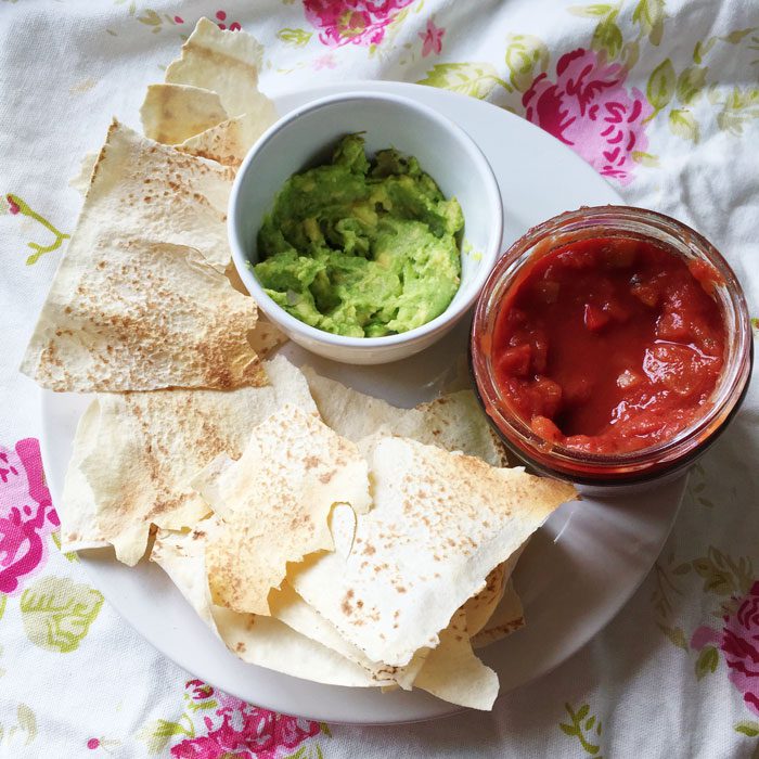 Chips with avocado and salsa