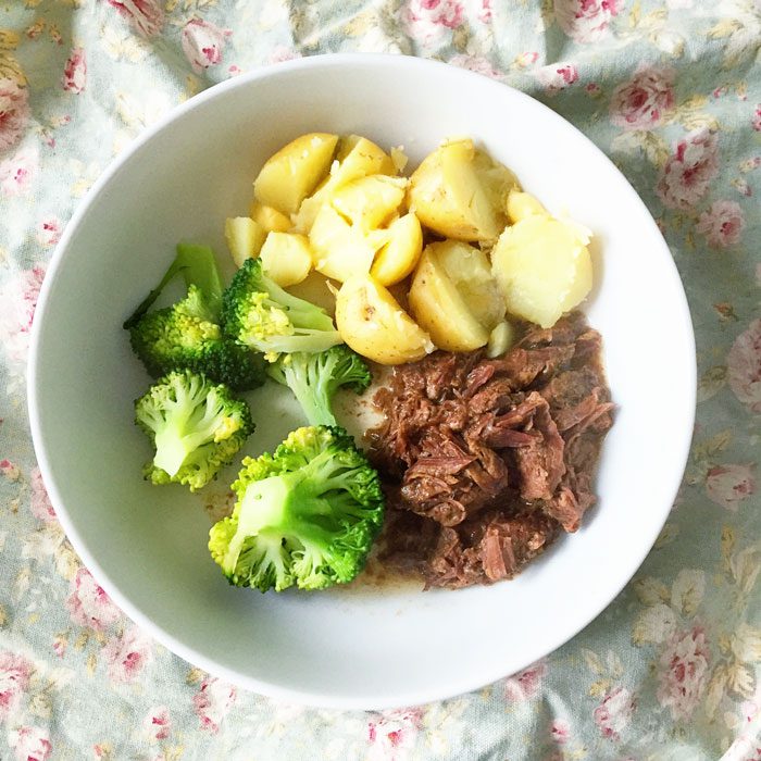 Slow cooked beef with new potatoes and broccoli