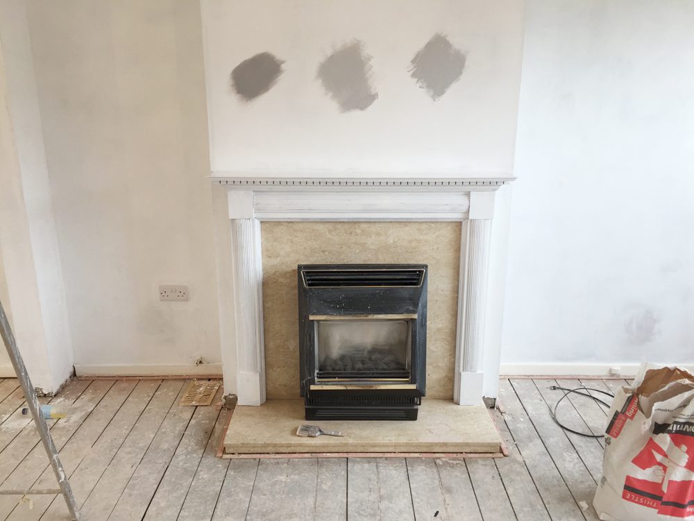 Fireplace with paint swatches