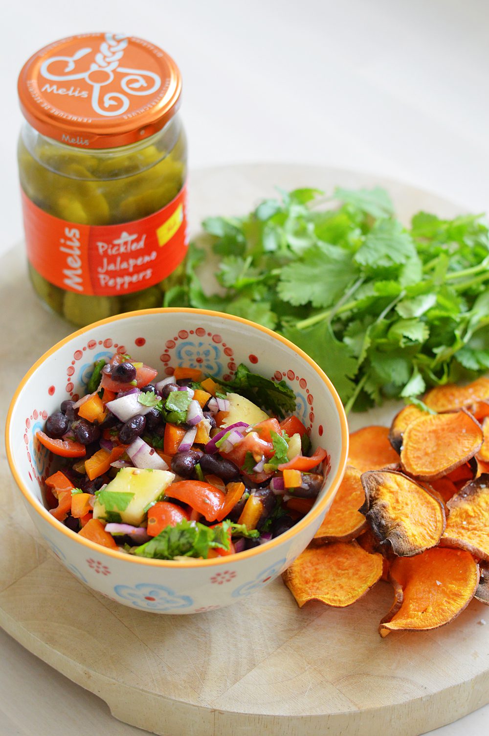 Black bean and mango salsa top